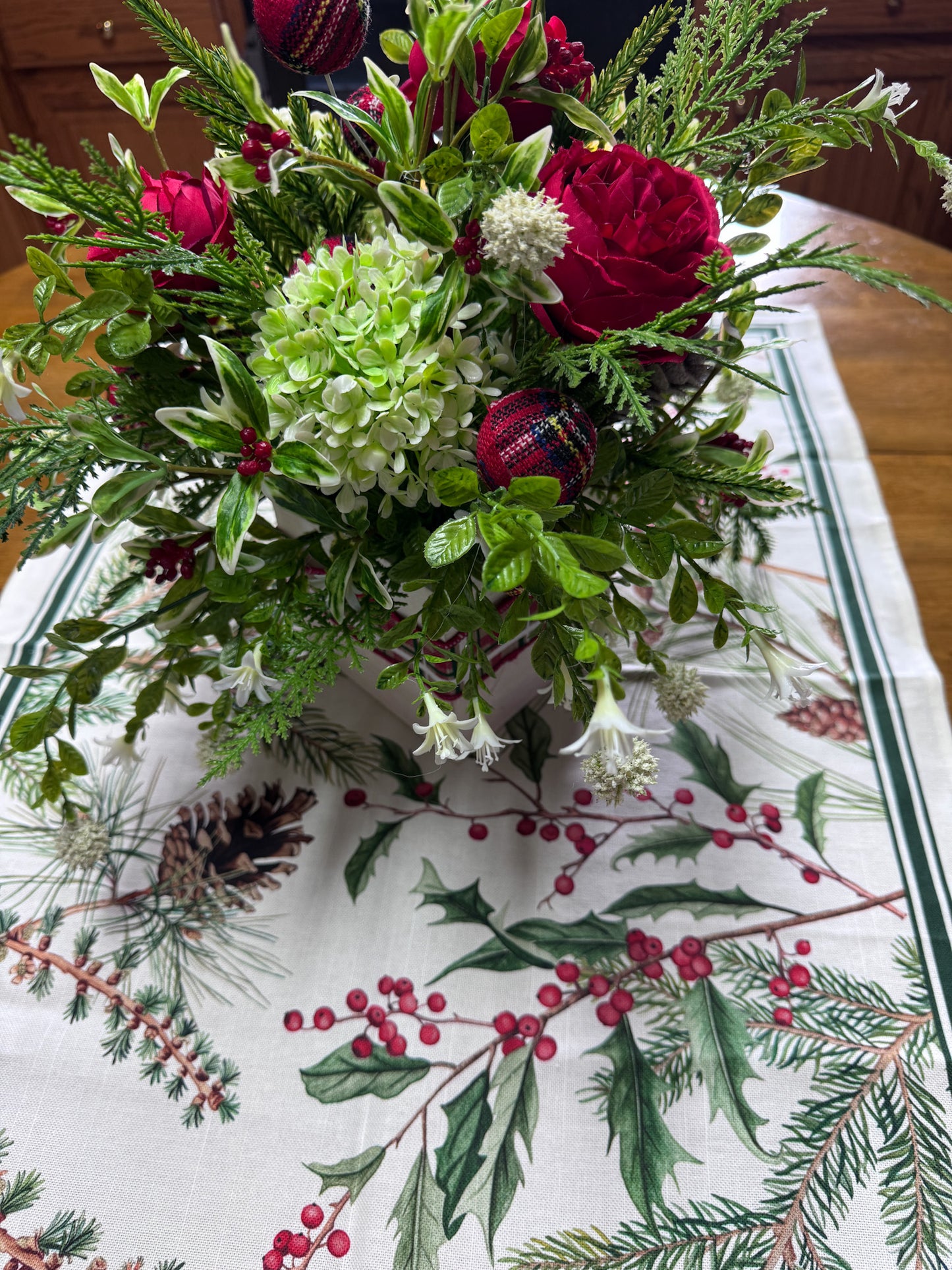 Traditional Red Rose Holiday Centerpiece – Mixed Greenery & Textured Accents