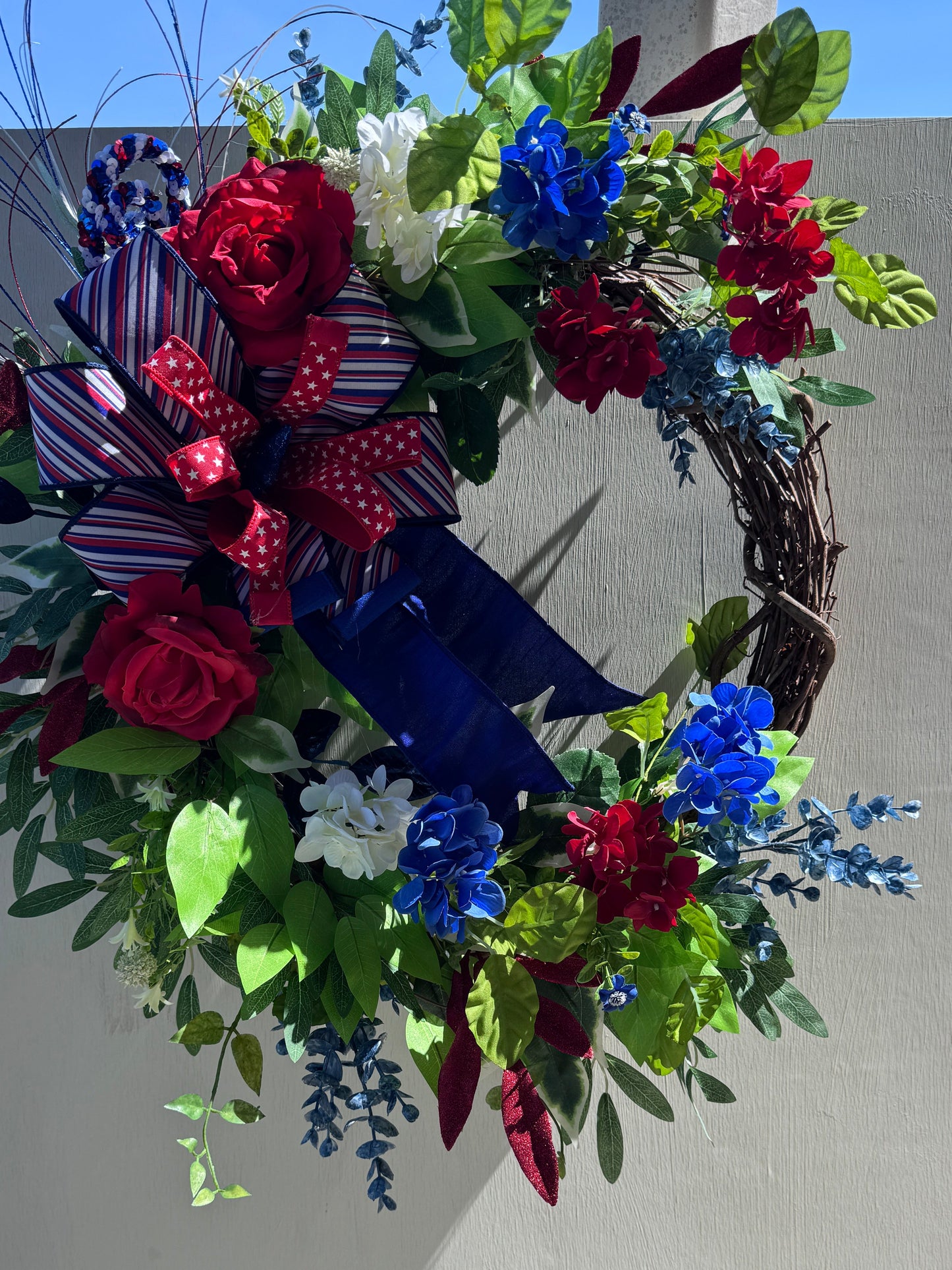 Patriotic Grapevine Wreath | Americana Floral Front Door Decor | Red White and Blue Summer Wreath