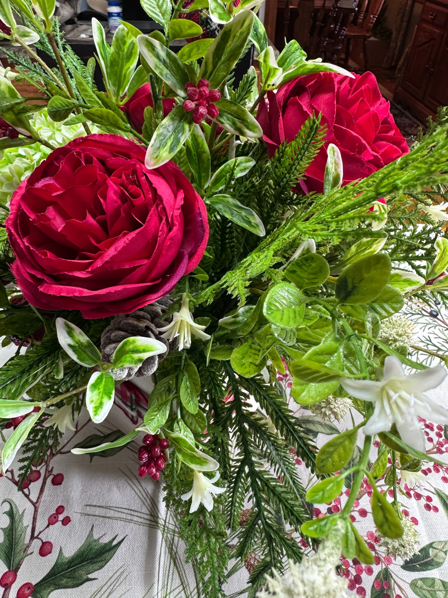 Traditional Red Rose Holiday Centerpiece – Mixed Greenery & Textured Accents